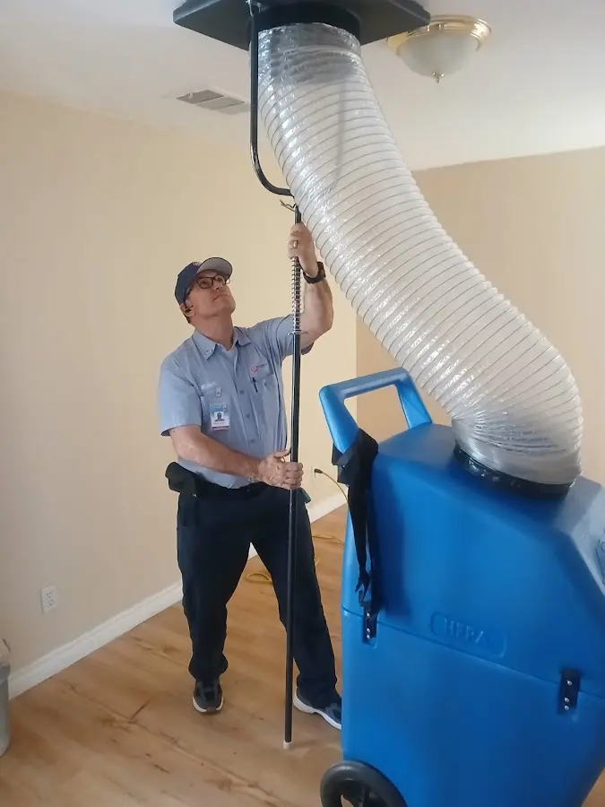 HVAC Installation technician using HEPA equipment in Arden-Arcade